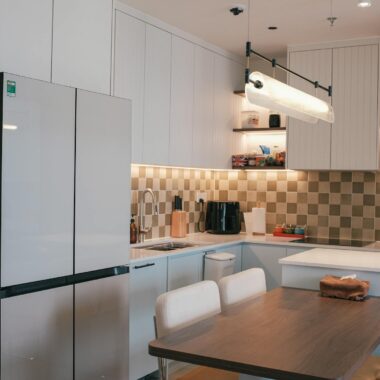 Stylish kitchen interior featuring sleek design and warm lighting.