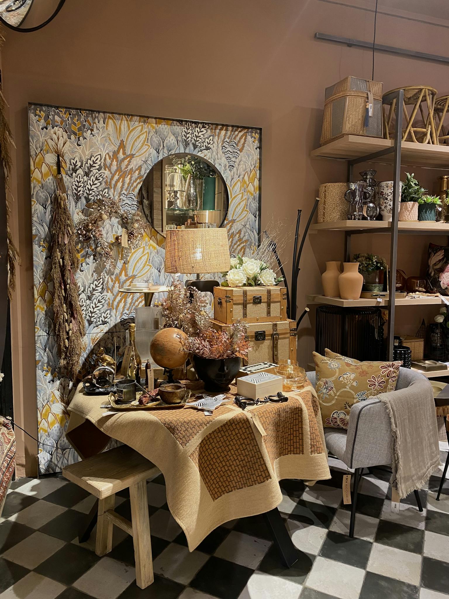 Warm indoor space featuring decor items, textile, and furniture.